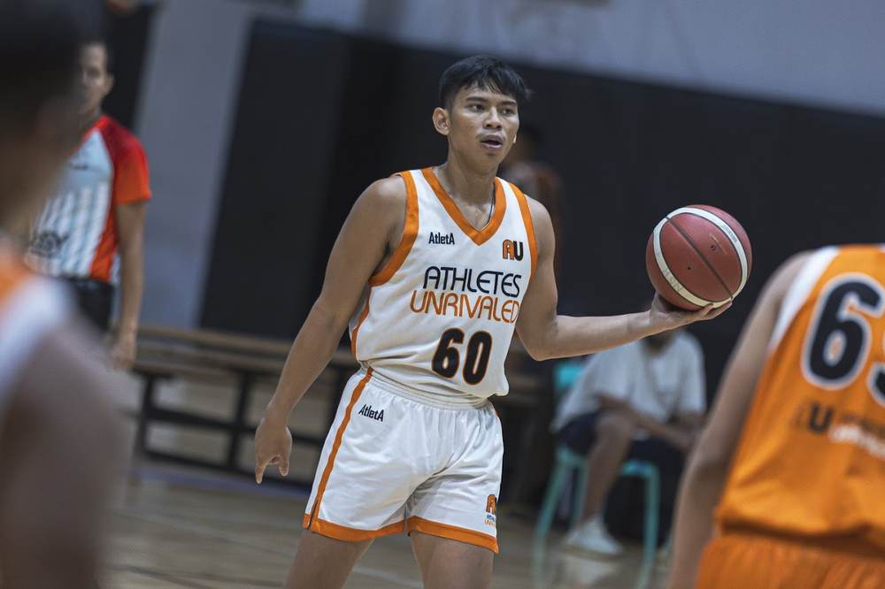 Athletes Unrivaled player handling the ball during live competition